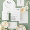 Modern monogram wedding invitation in black and white