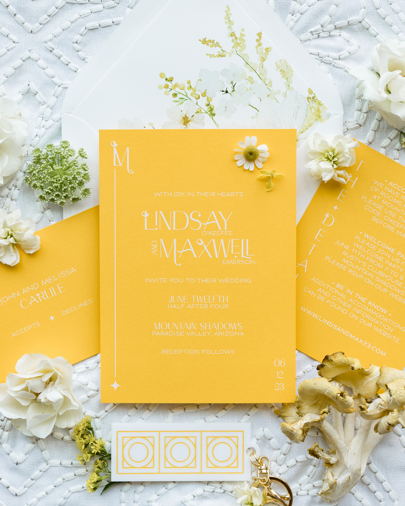 golden yellow wedding invitation with white ink printing in a mid-century modern design