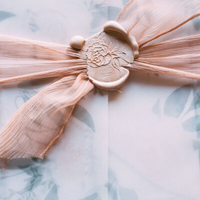 wax seal blush wedding invitation detail shot Gwen